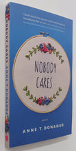 Load image into Gallery viewer, NOBODY CARES - Anne T. Donohue
