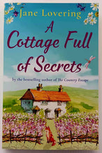 Load image into Gallery viewer, A COTTAGE FULL OF SECRETS - Jane Lovering