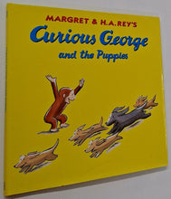Load image into Gallery viewer, CURIOUS GEORGE AND THE PUPPIES - H.A. Rey, Margret Rey
