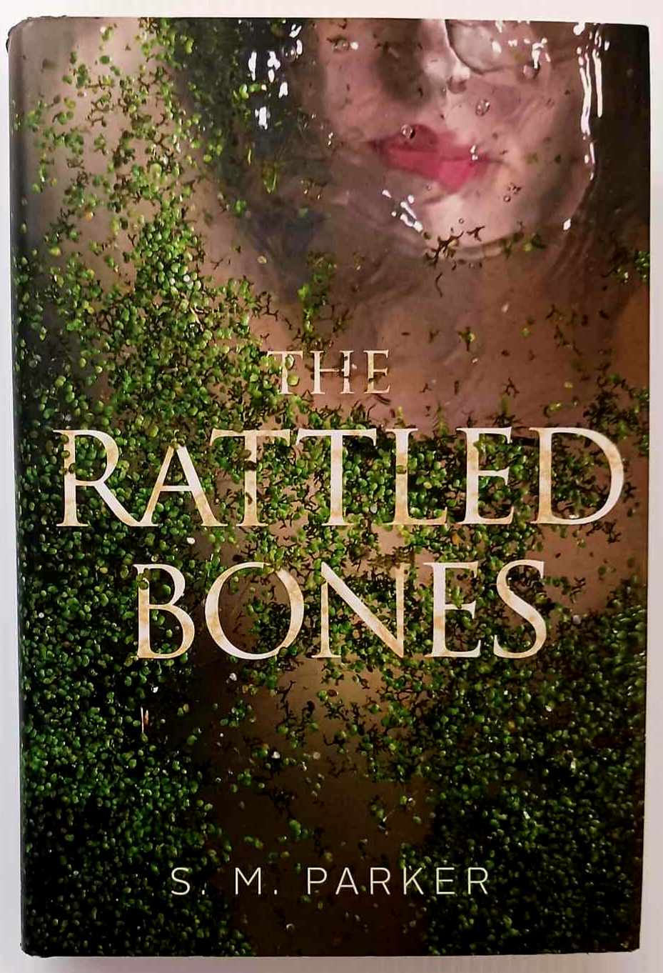 THE RATTLED BONES - S.M. Parker